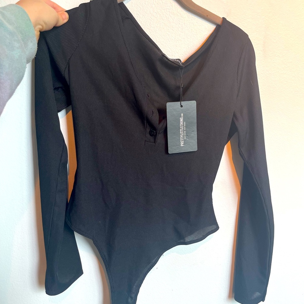 Never worn black body suit!! Size L or US 8